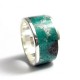 Ring made of silver with malachite flowers