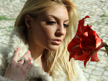 Coral ring and earrings made of silver on model